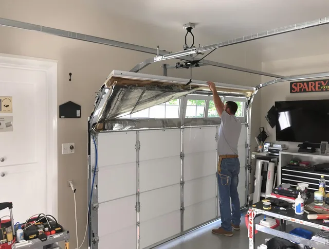 Garage door section replacement by Moreno Valley Garage Door Repair in Moreno Valley